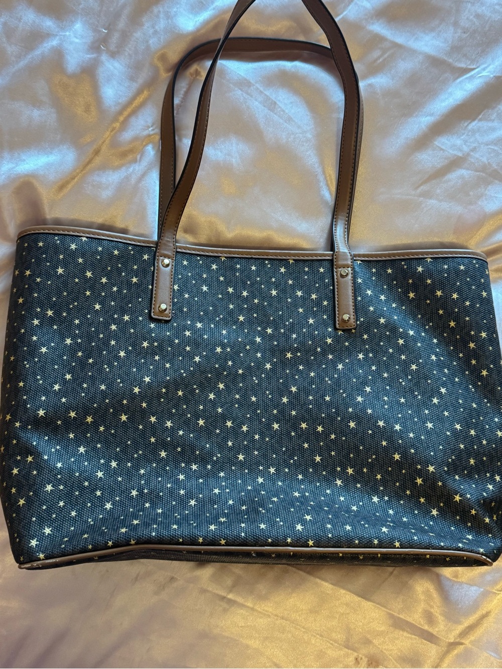 Michael Kors black  Tote with Gold Star Print and Brown Handles